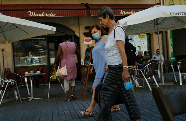 The Latest: Some Spanish regions reinstate nightlife curbs