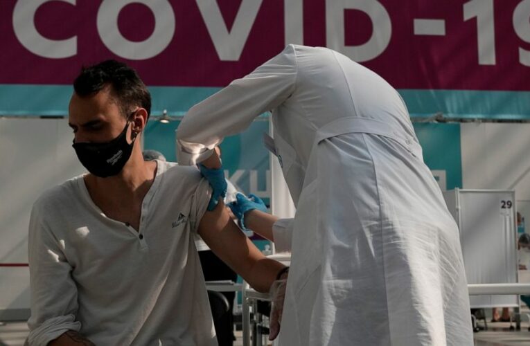 The Latest: India vaccine maker to produce Sputnik V