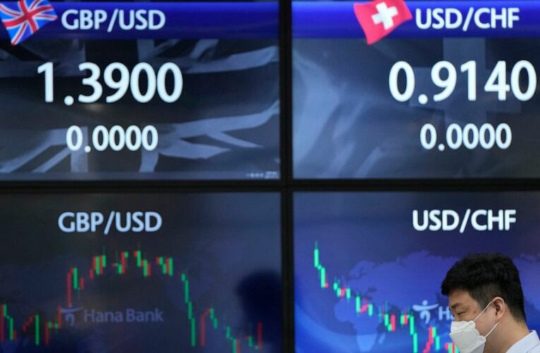 Global stocks mixed after Wall Street hits new high