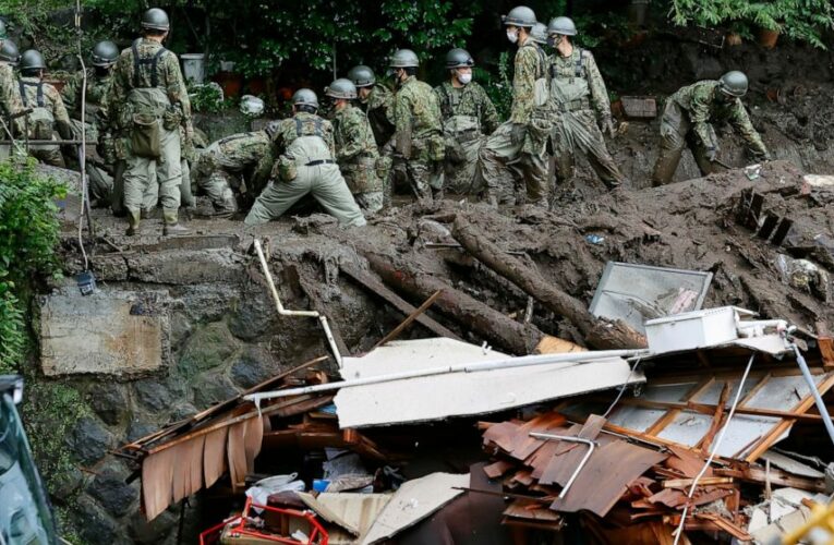 Japan searches for dozens missing in resort town mudslide