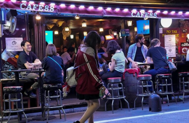 Tokyo’s drinkers drown frustrations over virus limits, Games