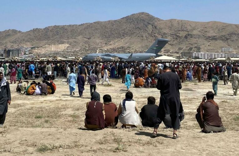 At Kabul’s airport, more than 20,000 people are trying to escape