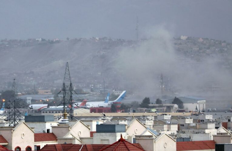 US troops, Afghans killed in suicide attacks outside airport
