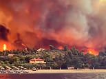 Dramatic footage shows Greek island engulfed in flame as residents are forced to flee across the sea