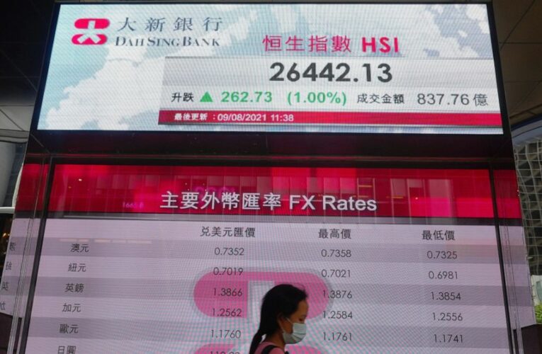 Asian shares mixed as virus fears temper market optimism