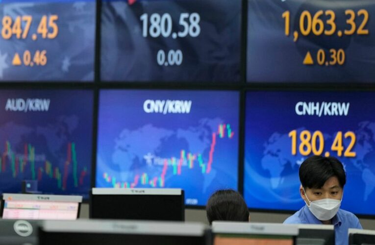 Stocks rally to records amid relief rates will remain low
