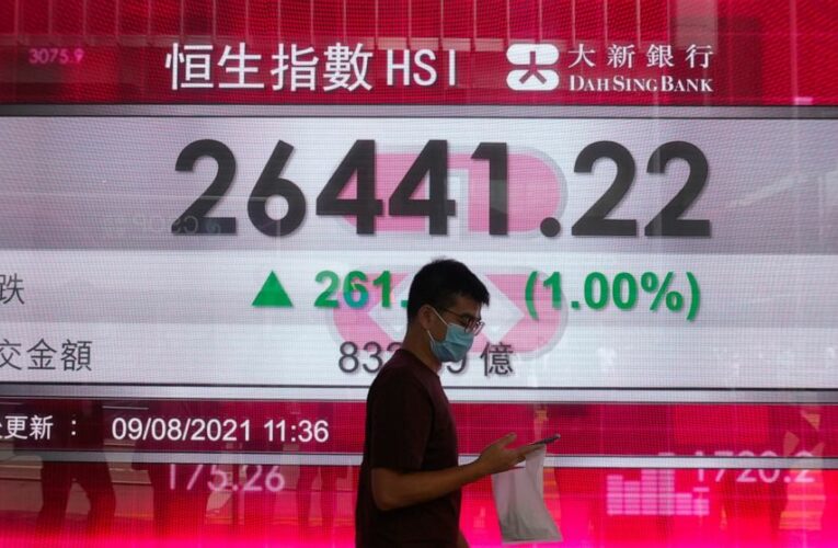 Asian stocks follow Wall Street up as virus curbs tightened