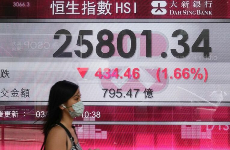 Stocks shake off a wobbly start, end higher on Wall Street