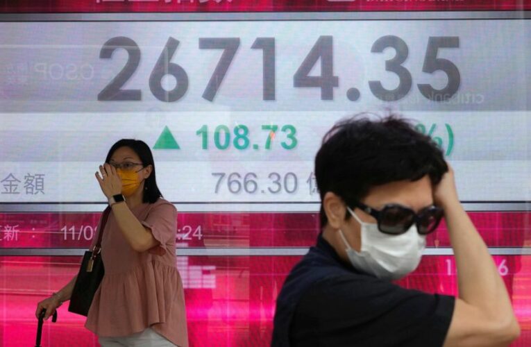World stocks mixed ahead of key data on US inflation