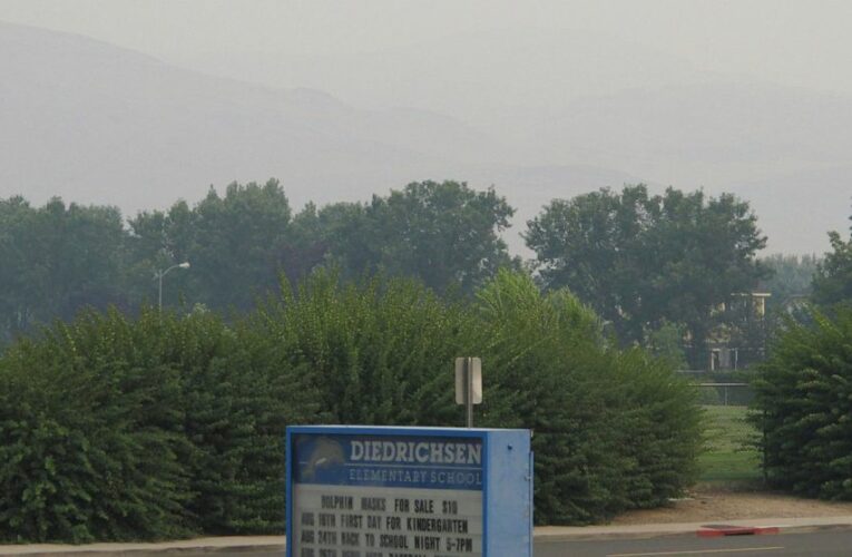 Pristine Lake Tahoe shrouded in smoke from threatening fire