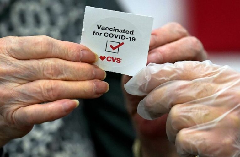 From CVS to Goldman Sachs, FDA move prompts vaccine mandates