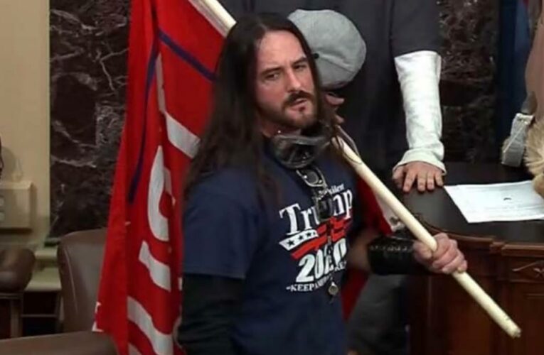 US Capitol rioter who stormed Senate floor reports to prison while trying to undo his felony guilty plea