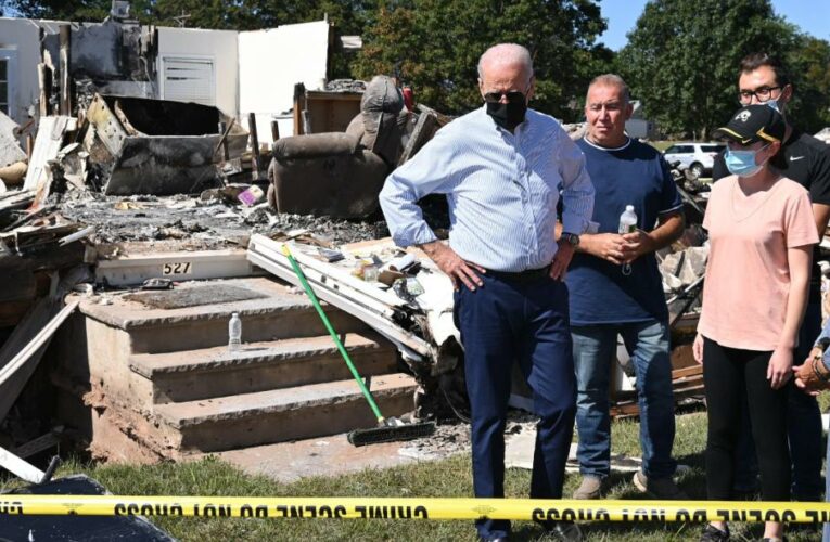 ‘The nation and the world are in peril,’ President Biden warned as he viewed the destruction wreaked by Ida