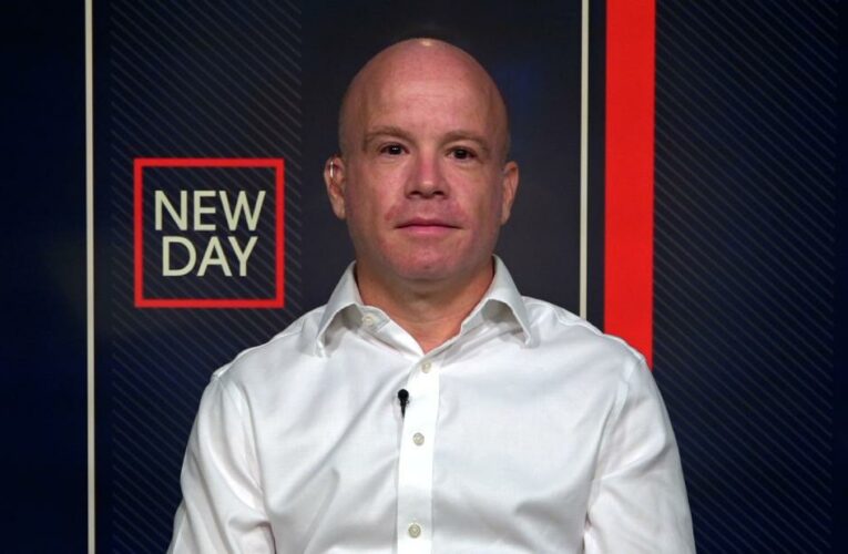 Dad threatened by anti-mask crowd says son has Covid-19