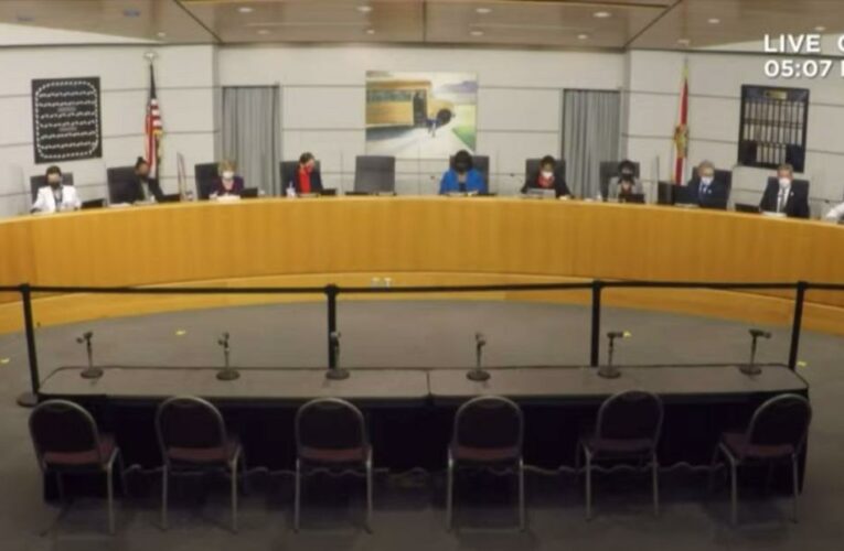 Heavy police presence at Florida school board meeting where mask wearers separated from those without masks