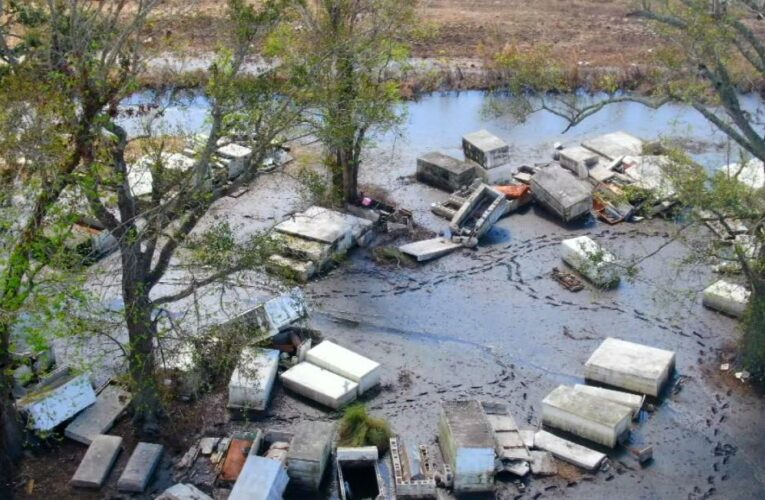 The search for missing loved ones is complicated by the high grass, marsh mud and snakes, a local pastor says