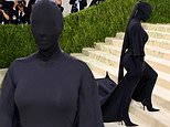 Kim Kardashian goes undercover! Kanye West inspires ex to swap sexy frocks for balaclava at Met Gala