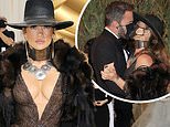 Jennifer Lopez lassos Ben Affleck in for a masked KISS during the Met Gala