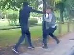Shocking footage captures moment hooded thug  repeatedly stabs pedestrian in the back