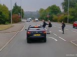VIDEO: Driver almost wipes out pedestrians while overtaking a truck