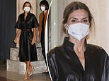 Beautiful in black! Queen Letizia of Spain channels rock chick style in a leather belted dress