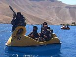 Armed Taliban fighters ride PEDALOS on lake in Afghanistan national park