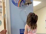 Heartwarming moment four-year-old girl who beat leukaemia rings hospital bell