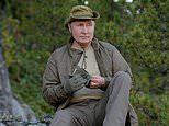 Kremlin issues photos of Putin on hunting break with minister in bid to ‘play down health rumours’