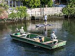 Anglers use punt boat to block paddle-boarders going under River Avon bridge as bitter war escalates