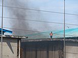 Six prisoners are BEHEADED as at least 29 are killed in fight between rival drug gangs in Ecuador