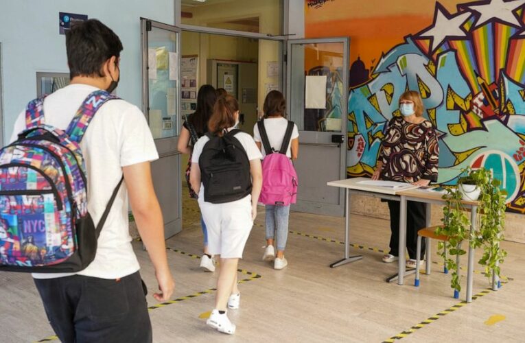 The Latest: Students return in Romania, face restrictions