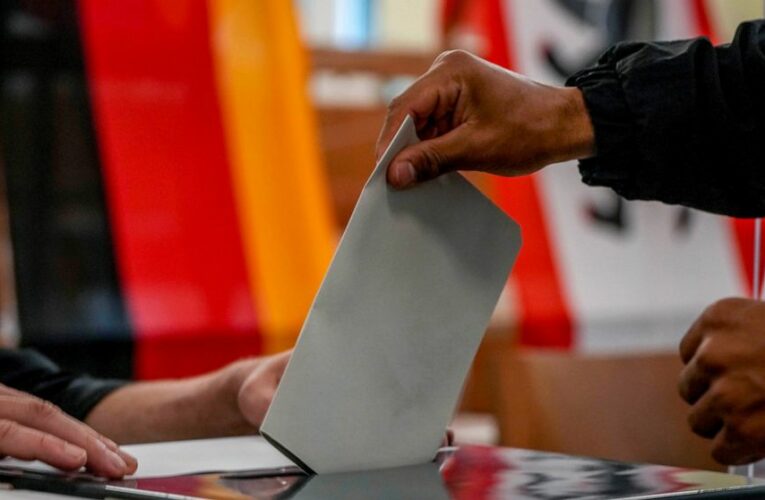 The Latest: Germany’s Social Democrats cautiously optimistic