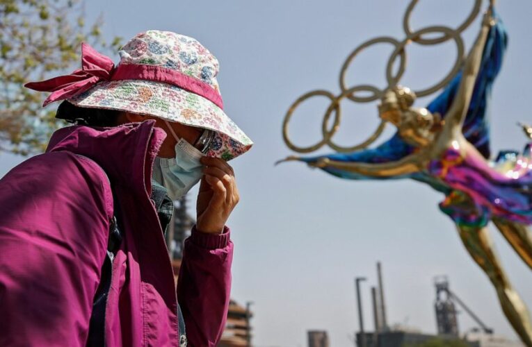 China keeps virus at bay at high cost ahead of Olympics