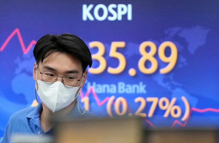 Wall Street opens mostly lower, clinging to weekly gains