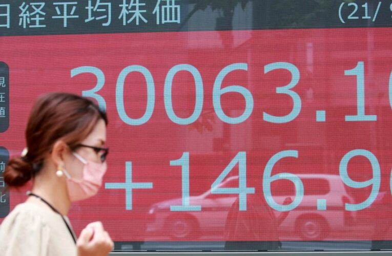 Stocks slip as investors monitor the Fed, virus impact