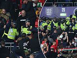 Hungary fans involved in ugly clashes with police at Wembley as officers use batons