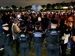 Hundreds of mourners carry lanterns and candles to remember Sir David Amess at vigil in memory of MP