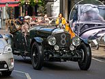 Jason Momoa checks out the sights of London in style in a Bentley convertible