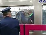 Man, 24, dressed as the Joker STABS 10 people on Tokyo train before setting the carriage on fire