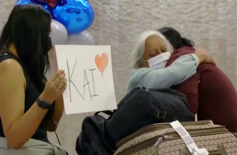 International travelers reunite with loved ones as US reopens