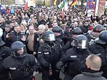 Thousands of Covid deniers clash with German police during rally in Leipzig with sprays of tear gas