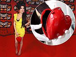 Amy Winehouse’s heart shaped Moschino bag sells for &pound;150,000 at charity auction