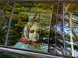 Queen is spotted being driven around Sandringham in Range Rover as monarch continues recovery