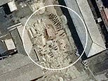 North Korean prisoners are seen lined up for another day of gruelling work in rare photos