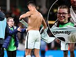 Cristiano Ronaldo gives young tearful fan his shirt and a hug after Portugal draw