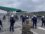 Lukashenko’s ‘weaponised migrants’ cheer as they smash through Polish border fence