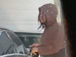 Woman rips wing mirror off a man’s car at a petrol station before running off [Video]
