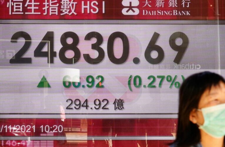 Asian stock markets lower after Wall St hits record again