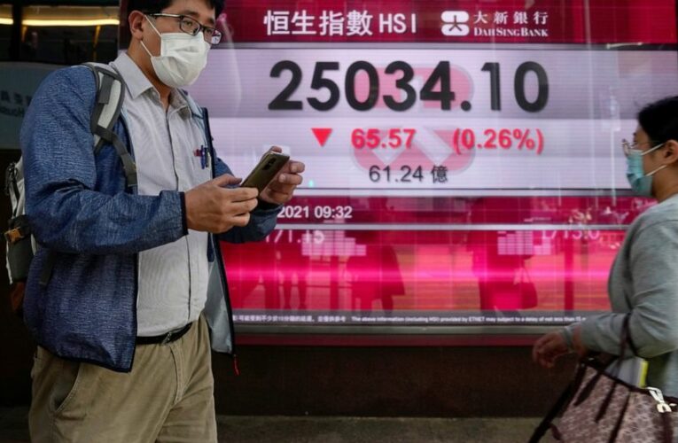 Stocks rise after Fed signals plans to ease bond buying