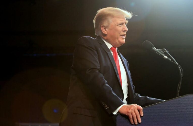 Trump met with boos after saying he got Covid booster